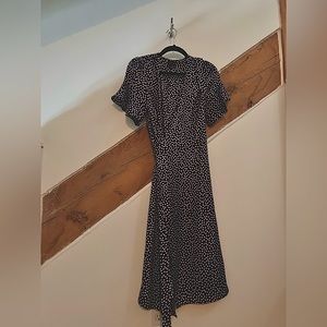 Super great fit wrap dress. New. Purple white polka dots.